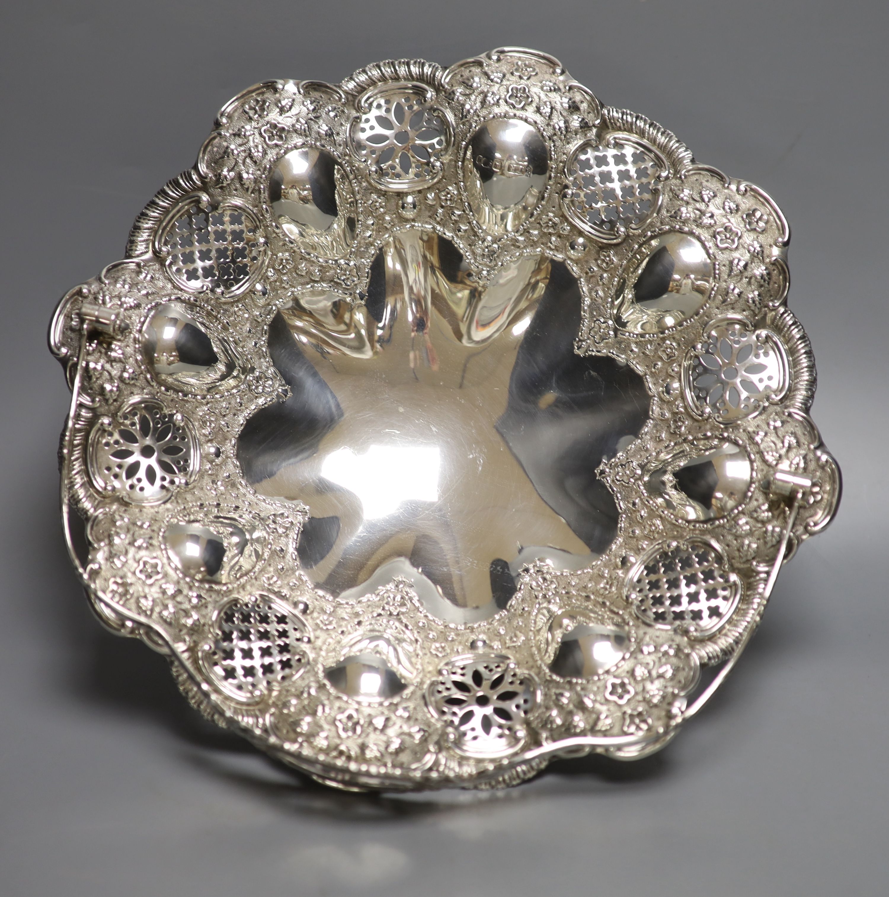 An Edwardian embossed silver fruit basket, Joseph Rodgers & Sons, Sheffield, 1903, 28cm,